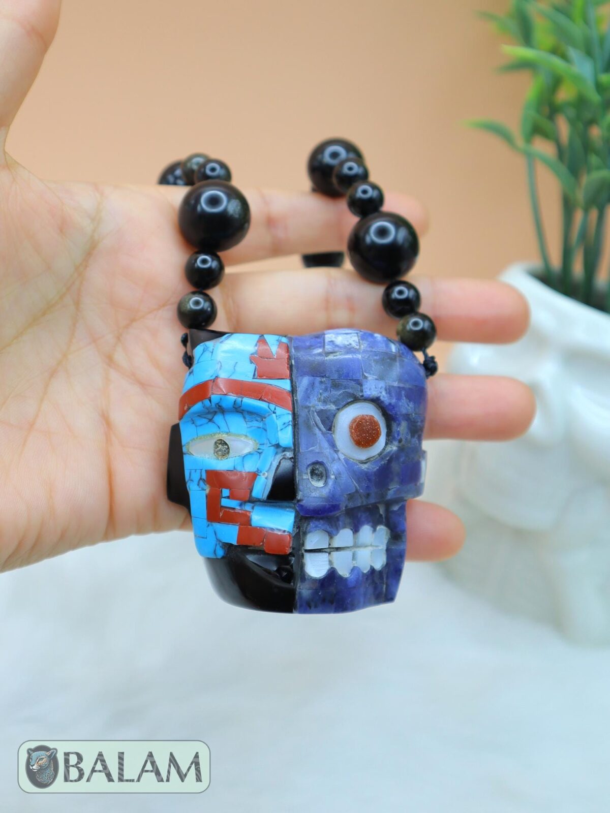 Duality of life and death necklace, Ceremonial Necklace, Obsidian, beads. Teotihuacan mask obsidian with aventurine, turquoise inlays.